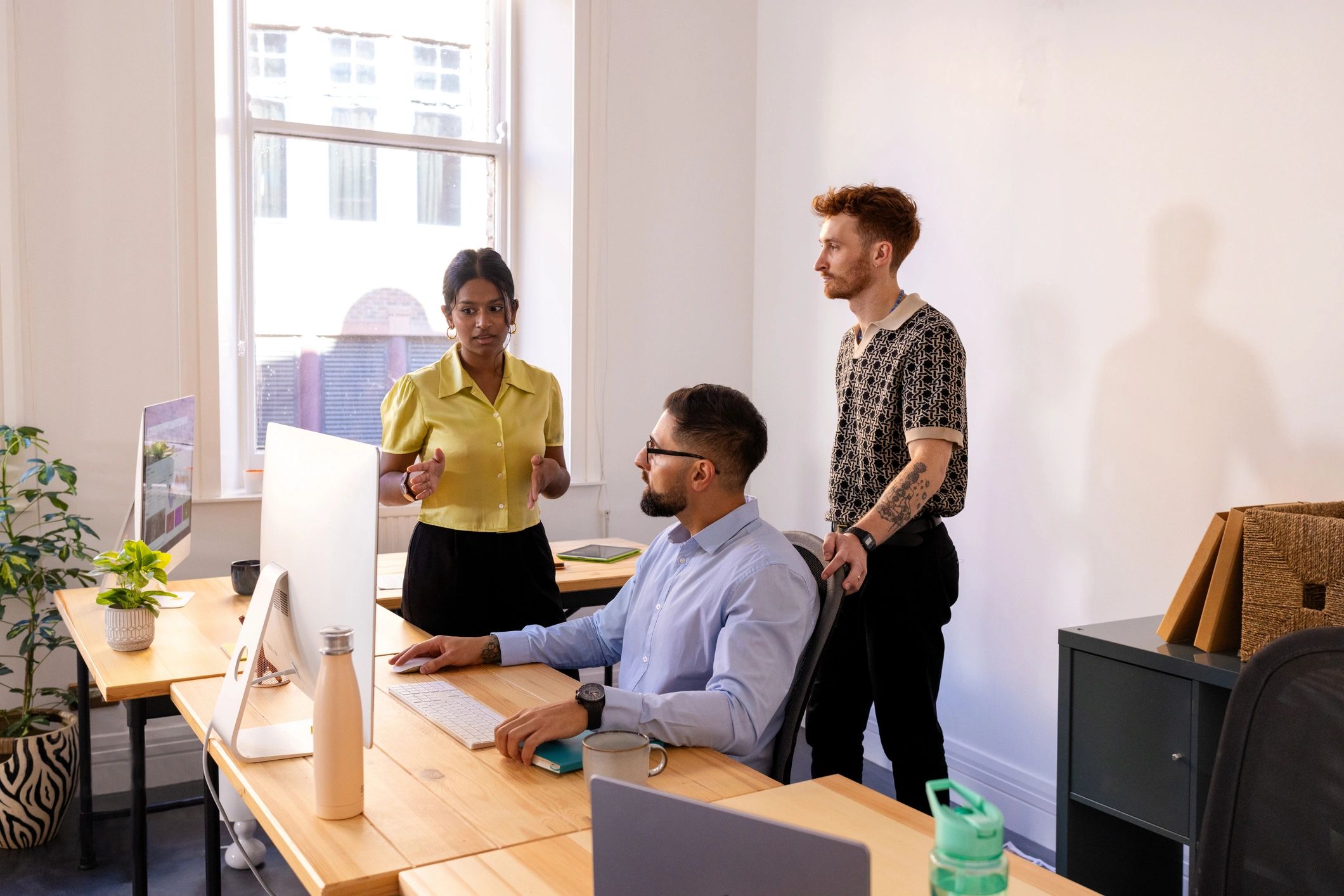 Professional team collaborating in a clean office environment